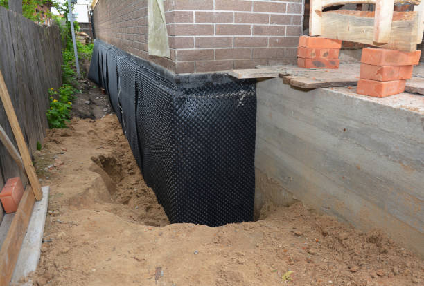 SJ Waterproofing Pros technician performing targeted Waterproofing assessment in Beaumont, KS